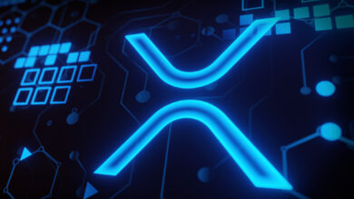Ripple XRP crypto currency theme concept. Ripple coin or XRP icon on modern circuit board background